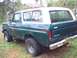 1979 Ford Bronco - This 1978 Ford Bronco is seen from a 3q-front angle, with its green body and white roof clearly visible.