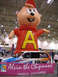 1970 Mercury Cougar - A minivan is decorated with Alvin and the Chipmunks imagery and displayed under a large inflatable Alvin figure.