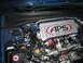 2007 Subaru Impreza - Engine bay of a 2007 Subaru Impreza, an APS intercooler and K&N air filter.