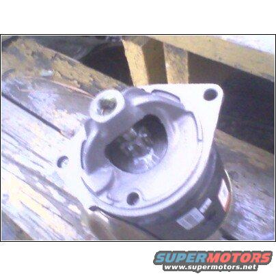 Close-up of an automotive part, possibly a pump housing