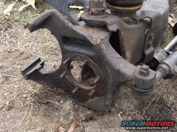 passknuckle.jpg Then the axle shaft will pull out and you will be left with the empty knuckle.