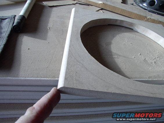 img_0390.jpg A quick run around the outside of the covers with a router and the cloth material should have no problem stretching over it.