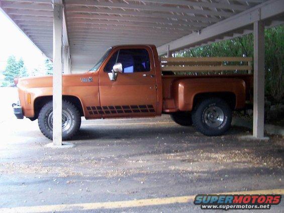 Orange 1979 Chevrolet C/K Pickup truck, side view