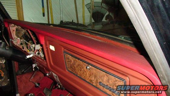 1979 Ford F-150 dashboard with woodgrain trim and exposed wiring