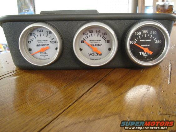 Triple gauge pod with Auto Meter oil pressure, volts, and transmission temp gauges