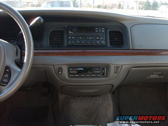 1993 Ford Crown Victoria interior dashboard with wood trim and radio