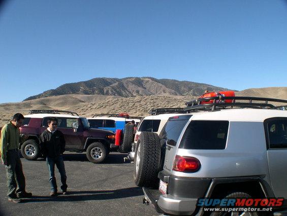 Silver 2007 Toyota FJ Cruiser rear quarter view with roof rack and gas can