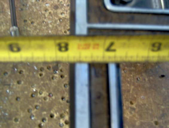 013.jpg 7 5/16" on this end, not square from the factory