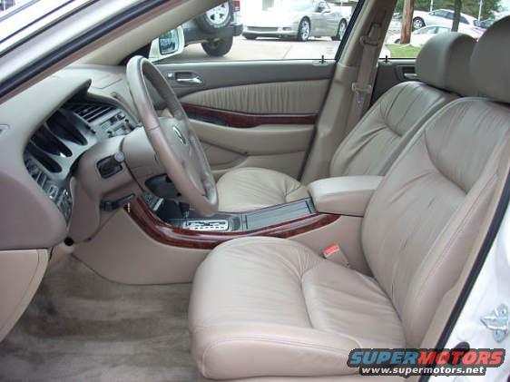 Interior view of 2003 Acura TL showing leather seats and dashboard