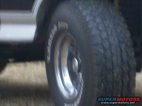 Wheel and tire with text on sidewall