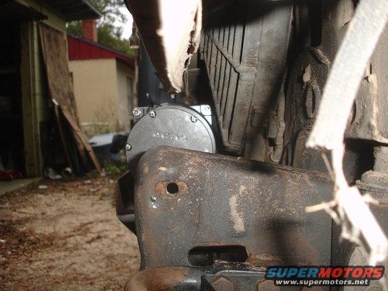 Close-up of winch mount with visible text on circular component