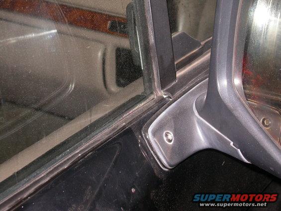 Close-up of car door interior trim and window seal