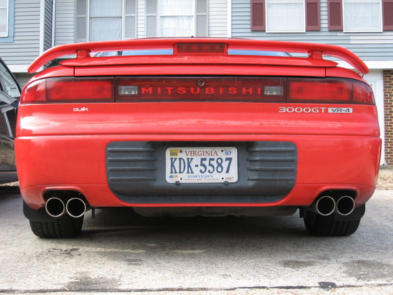 Red 1991 Mitsubishi 3000GT VR-4 rear with quad exhaust and spoiler