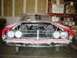 1968 Ford Torino - Front view of a 1968 Ford Torino, showing the grille and headlight area with the hood off.