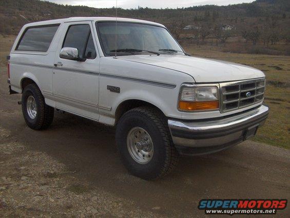 New 33x12.50 tires, on stock suspension. I also removed the running boards and the hood mounted wind deflector.