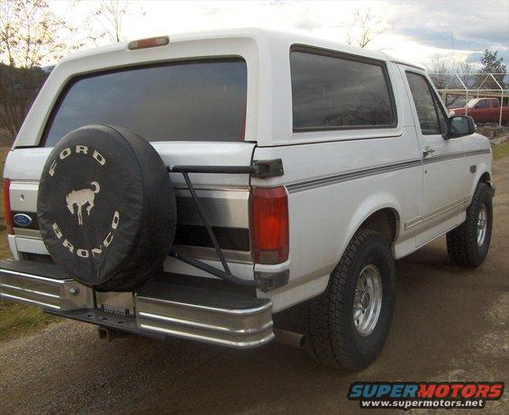 New 33x12.50 tires, on stock suspension. I also removed the running boards and the hood mounted wind deflector.