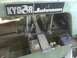 1996 Ford Bronco - A Kysor Johnson metal cutting saw is shown in operation, cutting a piece of metal stock.