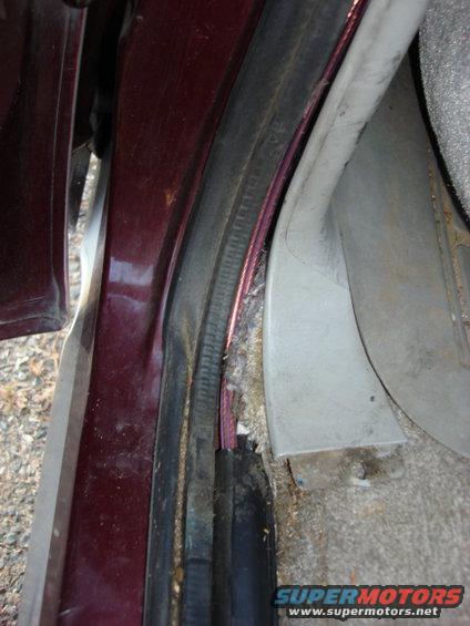 radio31.jpg this is the door pillar between the drivers door and the rear door after removing the floor covers (3 phillips screws) this panel has clips and pops right off with little force.