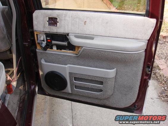 radio74.jpg here is the door panel reinstalled.all that is left here is the switch trim panel.