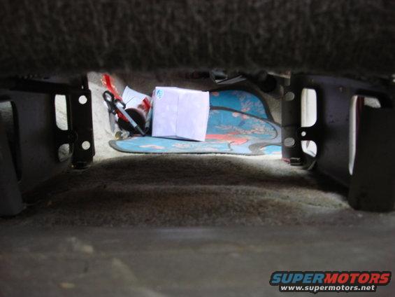 radio78.jpg here is the space below the pass seat. the sub amp and power block will work great here. out of sight and lots of air.