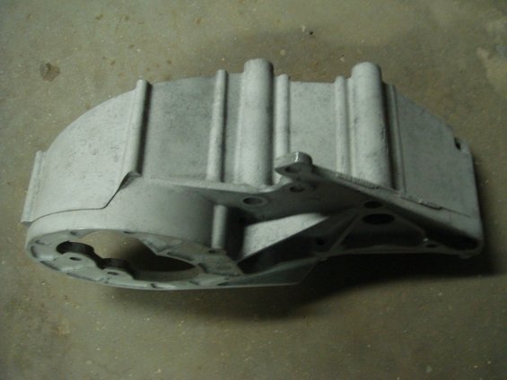 Aluminum casting part with mounting bracket and circular opening