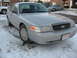 2004 Ford Crown Victoria - This 2004 Ford Crown Victoria is parked outside in the snow.