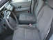 2004 Ford Crown Victoria - Interior view of a 2004 Ford Crown Victoria, highlighting the front seating area and controls.
