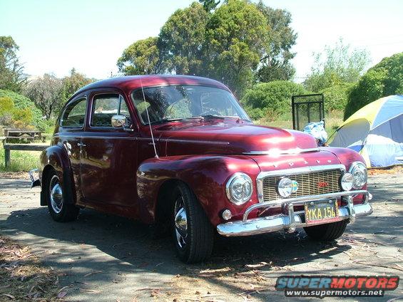 dscf3571.jpg 1964 Volvo PV544 Sedan. Paint: GM Med Red Garnet Metallic. Headlights are Xenon Gas, as are the driving lights. Wheels are painted to match the body, trim rings and Baby Moon hubcaps installed. I have the restored set of original hubcaps in storage.

5-1/2" Volvo slotted steel wheels (over width from stock) Michelin 'X10' tires.