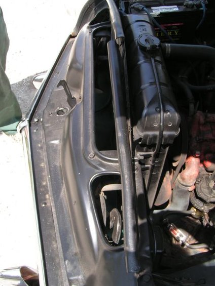 1956 Ford Fairlane engine bay showing radiator and inner fender