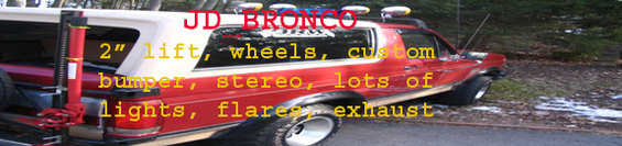 Red 1989 Ford Bronco with custom bumper, lights, and lift kit