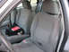 2004 Ford Crown Victoria - Front interior of a 2004 Ford Crown Victoria, cloth seats and a view of the dashboard.