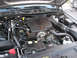 2004 Ford Crown Victoria - Engine bay of a 2004 Ford Crown Victoria, showing the V8 engine and associated components.
