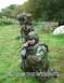 1992 Ford Mustang - Soldiers in tactical gear are positioned in a grassy outdoor area, with text overlaying the image.