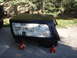 1992 Ford Bronco - re-painting the top. after 15 years the original black paint began to look dull. after a quick sanding i applyed the first coat of paint.