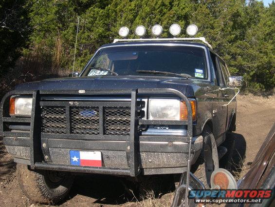 1990 Ford Bronco front view with brush guard and roof lights