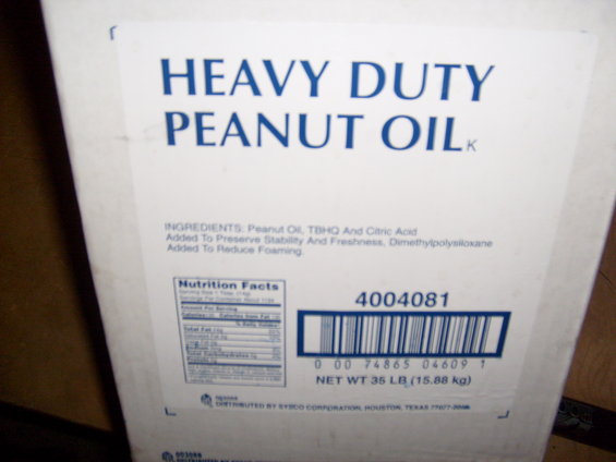 Box with 'HEAVY DUTY PEANUT OIL' and nutrition facts label