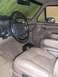 1996 Ford Bronco - The interior of a 1992 Ford Bronco, tan leather seats and a detailed dashboard.