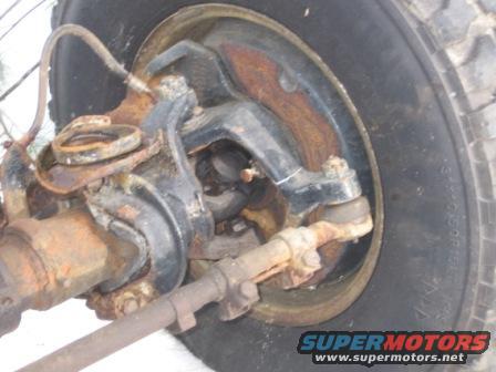 Rusty suspension components and tire of a vehicle