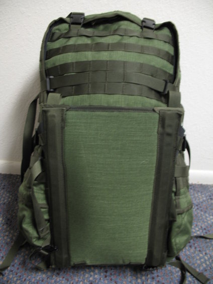 Green tactical backpack with MOLLE webbing