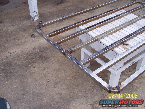 Metal rack with welded joints on a concrete surface