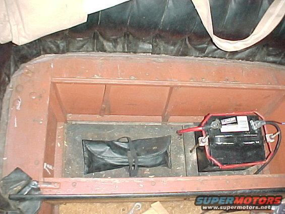 Small 12V battery under the back seat