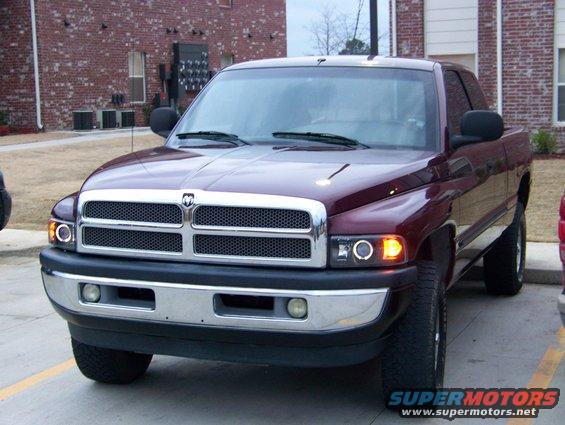 Maroon 2001 Dodge 1500 pickup truck, front view