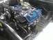 1978 Ford Bronco - Close-up view of a vehicle's engine compartment, showing various mechanical components and wiring.