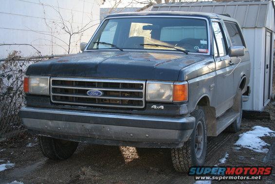 Front view of a 1990 Ford Bronco with a 4x4 badge
