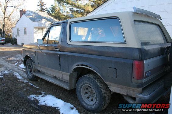 Dark blue and tan 1990 Ford Bronco, 3q-front view