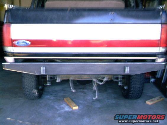 1989 Ford Bronco rear with custom metal bumper and red/white stripe tailgate