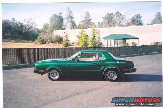 Here in a new picture on my 77 Mustang with new wheel centers