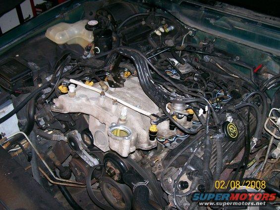 Engine bay with intake manifold and fuel injectors visible. Date stamp reads 02/08/2008