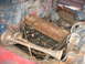 1949 Chevrolet C/K Pickup - The engine bay of an old truck is shown, a rusty inline-6 engine and prominent dual horns.