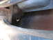 1949 Chevrolet C/K Pickup - Detail of corroded metal structure, possibly from a vehicle's undercarriage.
